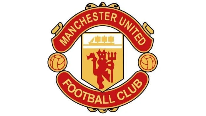 Logo Manchester United giai đoạn 1973-1998 với lá chắn vàng và Quỷ đỏ