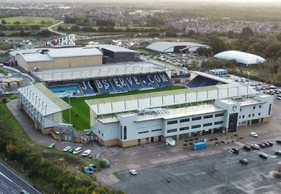 Toàn cảnh sân vận động JobServe Community Stadium từ trên cao, thể hiện kiến trúc hiện đại và không gian xung quanh.